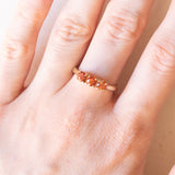 Anello trilogy moderno in oro giallo 9K con topazi arancioni trattati, anno 2006