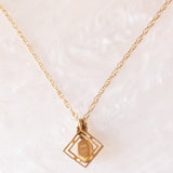 Collana vintage con catenina in oro giallo 9K e con ciondolo in oro giallo 9K con quarzo citrino (0.40ct ca.), anno 1978