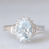 Anello a margherita vintage in platino con acquamarina (1ct) e diamanti, anni ‘70
