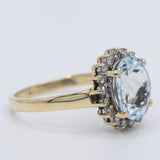 Anello a margherita vintage in oro giallo 9K con acquamarina (2ct ca.) e diamanti (0.18ctw ca.), anni 2000