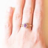 Anello a margherita vintage in oro giallo e bianco 9K con ametista (0.50ct ca.) e diamanti, anni ‘70