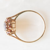 Anello a margherita vintage in oro giallo 9K con granati (1ctw ca.), anni ‘70