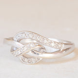 Anello vintage a nodo in oro bianco 9K con diamanti (0.06ctw ca.), anni ‘90