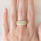 Tripla veretta in oro giallo 14K con peridoti verdi (1ctw ca.) e opali (0.80ctw ca.), anni ‘80