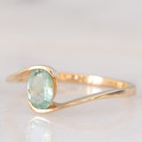 Solitario in oro giallo 9K con tormalina azzurra (0.34ct ca.)