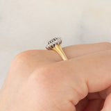Anello a margherita vintage in oro giallo 9K con zaffiro (0.70ct ca.) e diamanti (0.08ctw ca.), anno 1991