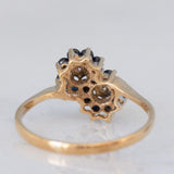 Toi et Moi con fiori in oro giallo 9K con zaffiri (0.40ctw ca.) e diamanti (0.02ctw ca.), anno 1997