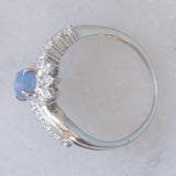Anello a margherita vintage in platino con zaffiro stellato (0.71ct) e diamanti (0.27ctw), anni ‘80/‘90
