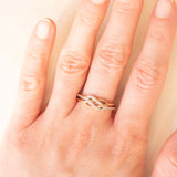 Anello intrecciato vintage in oro rosa e bianco 9K con diamanti, anni ‘90
