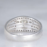 Anello a fascia vintage in platino con diamanti per un totale di 1.25ct (centrale di taglio princess 0.78ct), anni ‘80