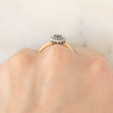 Anello a margherita vintage in oro giallo 9K con zaffiro (0.70ct ca.) e diamanti (0.08ctw ca.), anno 1991