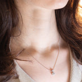 Cogli questa rosa - Collana vintage in platino con diamante rosa e diamanti bianchi