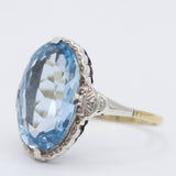 Anello da cocktail Art Déco in oro giallo 14K e argento con spinello azzurro (7.50ct ca.), anni ‘30