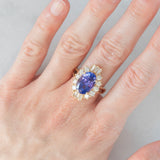 Anello ballerina vintage in oro giallo 14K con tanzanite (5.60ct ca.) e diamanti di taglio brillante e tapered (1.30ctw ca.), anni ‘70/‘80