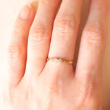 Trilogy vintage in oro giallo 9K con diamanti di taglio brillante (0.18ctw ca.)