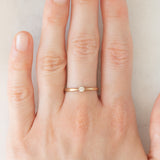 Solitario vintage in oro giallo 9K con diamante di taglio brillante (0.10ct ca.), anno 1982