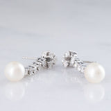 Orecchini pendenti vintage in oro bianco 14K con perle bianche e diamanti di taglio brillante (1.30ctw ca.), anni ‘70/‘80