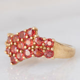 Anello in oro giallo 9K con pietre rosse
