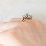 Anello a margherita antico in oro giallo 18K e argento con diamanti di taglio rosetta, primi del ‘900
