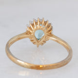 Anello a margherita a goccia in oro giallo 9K con apatite (0.59ct) e zirconi bianchi