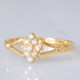 Anello a fiore vintage in oro giallo 14K con diamanti di taglio brillante (0.09ctw ca.), anni ‘60/‘70