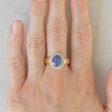 Anello a margherita vintage in oro giallo e bianco 14K con tanzanite (2.10ct ca.) e diamanti (0.30ctw ca.), anni ‘80