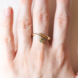 Anello a serpente vintage in oro giallo 18K con smeraldi e diamante di taglio brillante (0.02ct ca.), anni ‘70