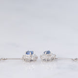 Orecchini pendenti a margherita vintage in platino con zaffiri (0.67ctw) e diamanti di taglio brillante (0.64ctw), anni ‘80/‘90