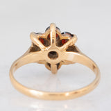 Anello a fiore vintage in oro giallo 9K con granati (0.70ctw ca.), anno 1966