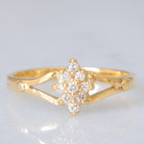 Anello a fiore vintage in oro giallo 14K con diamanti di taglio brillante (0.09ctw ca.), anni ‘60/‘70