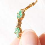 Braccialetto semirigido in oro giallo 14K con smeraldi (0.50ctw ca.) e diamanti (0.02ctw ca.), anni ‘70/‘80