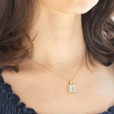 Ciondolo a margherita in oro giallo 14K con acquamarina (3.30ct ca.) e diamanti (0.22ctw ca.), anni ‘70