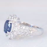 Anello a margherita a fascia in platino con zaffiro (1ct) e diamanti (1ctw), anni ‘80