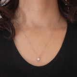 Collana con catenina in oro bianco 18K con punto luce in oro bianco 18K e con diamante di taglio vecchio (0.46ct ca.)