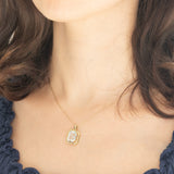 Ciondolo a margherita in oro giallo 14K con acquamarina (3.30ct ca.) e diamanti (0.22ctw ca.), anni ‘70