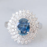 Anello a margherita vintage in platino con zaffiro (1.54ct) e diamanti (1.01ctw), anni ‘80