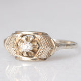 Solitario Art Déco in oro bianco 14K con diamante di taglio brillante (0.05ct ca.), anni ‘30