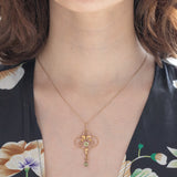 Pendente antico lavalier in oro giallo 9K con paste di vetro verdi, anni ‘10/‘20