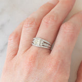 Anello a fascia vintage in platino con diamanti per un totale di 1.25ct (centrale di taglio princess 0.78ct), anni ‘80