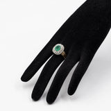 Anello vintage a margherita in oro giallo 14k con smeraldo (1.70ct) e diamanti (0.84ctw), anni '70