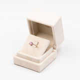 ANELLO VINTAGE IN ORO GIALLO 9K CON ZAFFIRO ROSA (0.44CT) E DIAMANTI