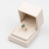 Anello vintage in oro giallo 14k con smeraldo (0,50ct) e diamanti (0,08ctw)