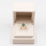 Anello vintage in oro giallo 14k con smeraldo (0,50ct) e diamanti (0,08ctw)