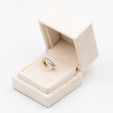 Anello vintage a riviera in oro giallo 9K con topazi azzurri di taglio carrè