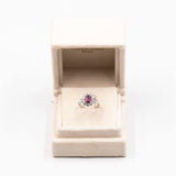 ANELLO VINTAGE A MARGHERITA IN PLATINO 850 CON RUBINO NATURALE (1CT) E DIAMANTI (0.85CT)