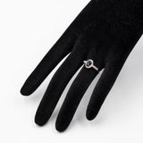 Anello vintage a margherita in oro bianco 9k con zaffiro e diamanti