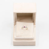 Anello vintage in oro bianco 14k con rubino e diamanti