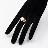 Anello vintage in oro giallo 18k raffigurante due sirene e uno stemma, anni '60