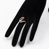 ANELLO ART NOUVEAU IN ORO GIALLO E BIANCO 18K CON RUBINO (0.55CT CA.) E DIAMANTI (0.70CTW CA.), FINE ANNI ‘20
