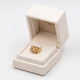 Anello harem vintage in oro giallo 18k con diamanti, rubini e zaffiri. Anni '70